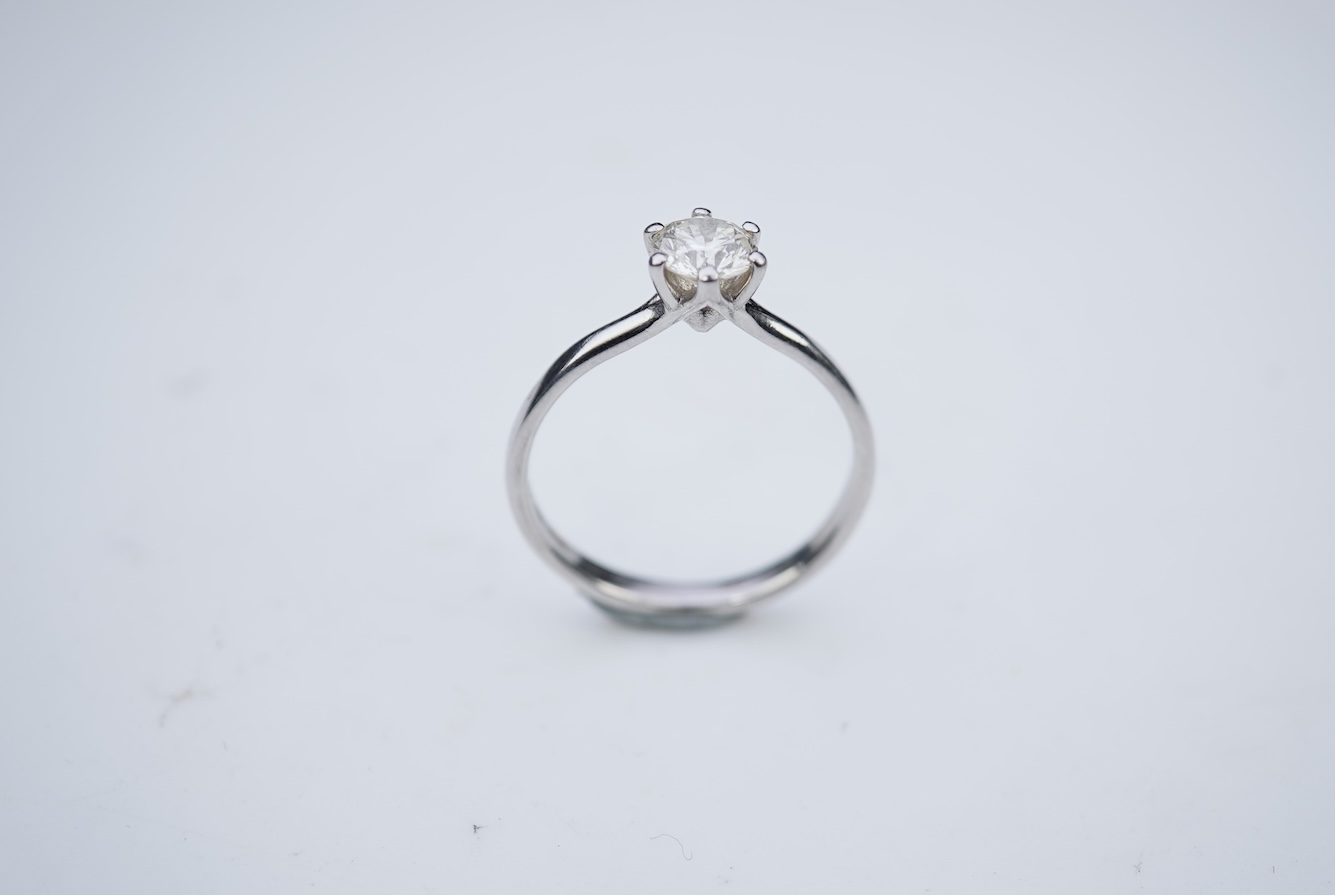 A diamond solitaire ring